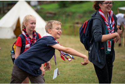 Boy Scout throws a horseshoe at the Jamboree