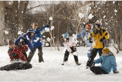 Scouts throw snowballs in a snowball fight