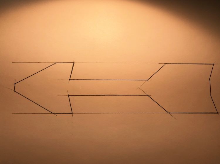 Pencil sketch of Pinewood Derby Arrow Car Shape on paper