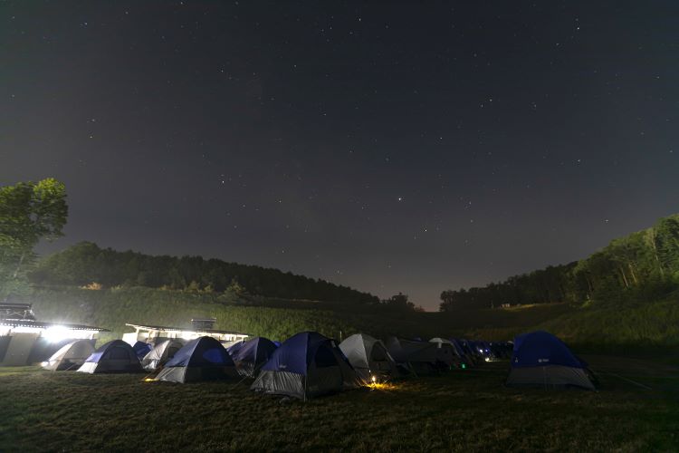 Tents on a troop campout at night