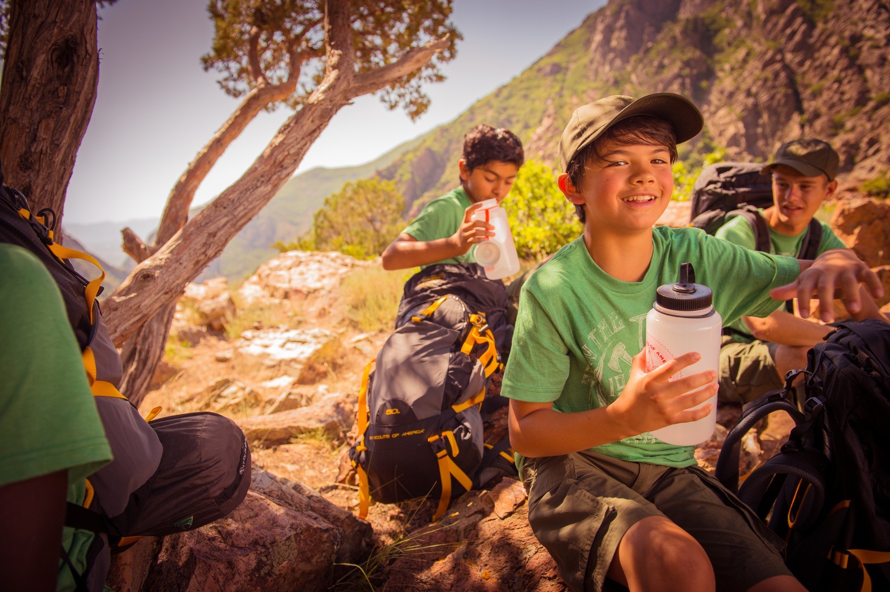 Kids camping in the summer kids staying hydration while camping in the summer